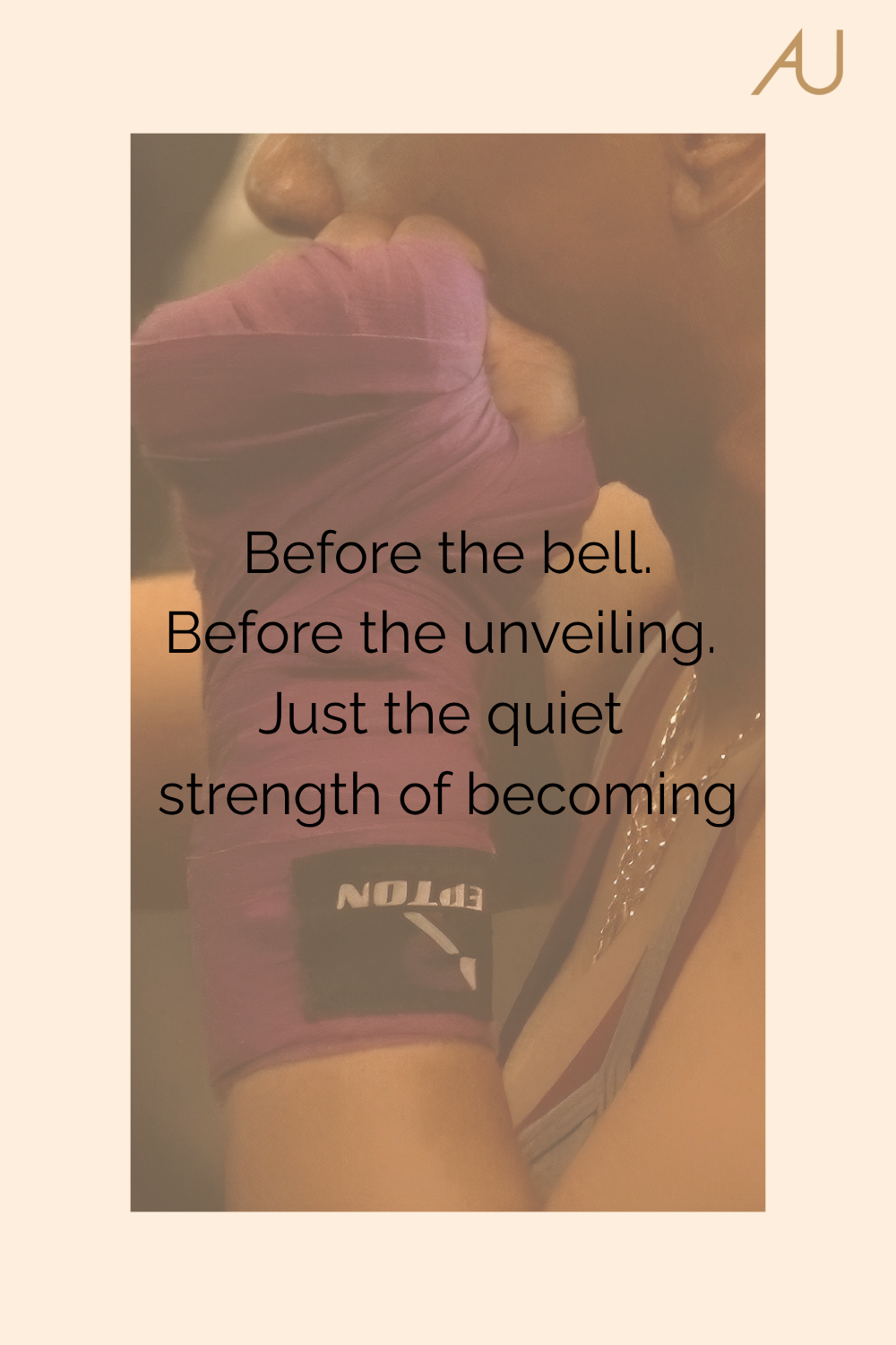 Amja's hands wrapped in boxing wraps. Text overlay: “Before the bell, before the unveiling. Just the quiet strength of becoming.