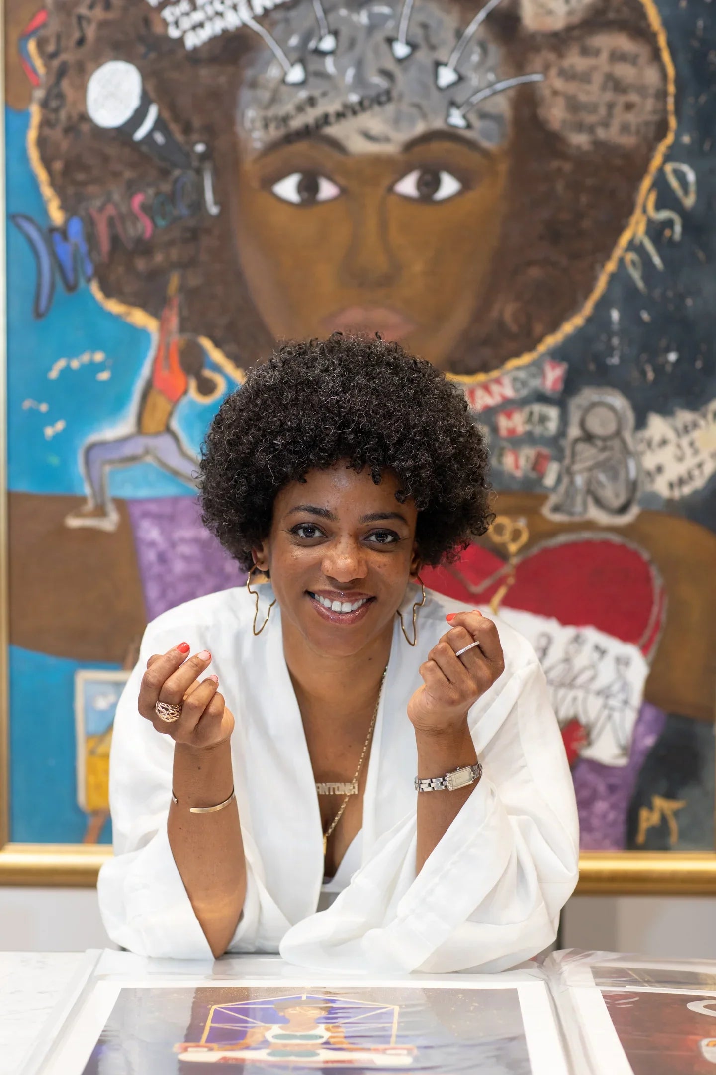 Amja at John Lewis in front the art work original Perception