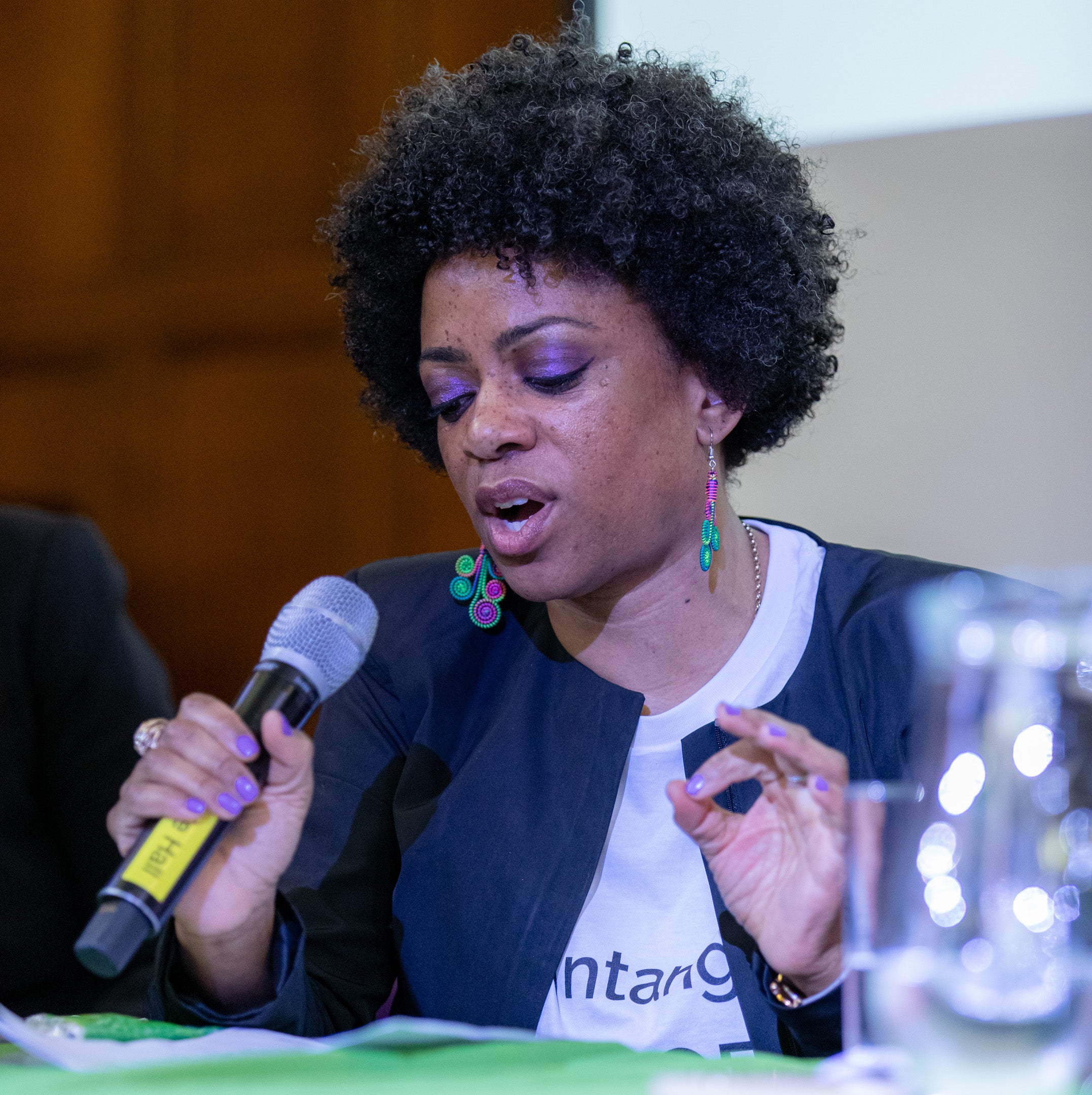 Load video: Speaker reel of Antonia (Amja) Lee delivering an art-led keynote, using storytelling and embodied presence to support leadership and cultural change in professional spaces